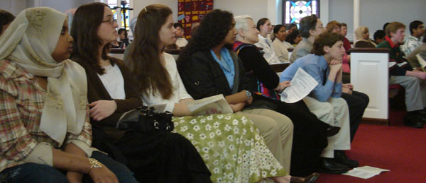 Photo of tellers and others listening